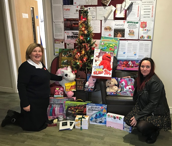 Stafford Salvation Army officer hails housebuilder for Christmas appeal toys